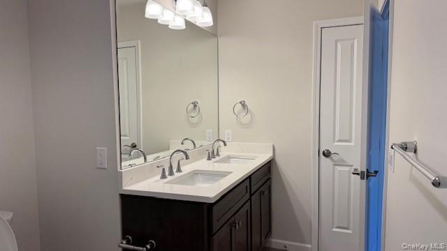 135 Cooper Road, Unit 3 Fishkill, NY 12524 - Photo 18 of 22 Bathroom featuring vanity and toilet