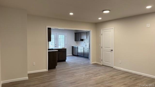 135 Cooper Road, Unit 3 Fishkill, NY 12524 - Photo 5 of 22 Kitchen featuring dishwasher, light wood-type flooring, and sink
