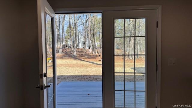 135 Cooper Road, Unit 3 Fishkill, NY 12524 - Photo 8 of 22 French doors from kitchen to back deck