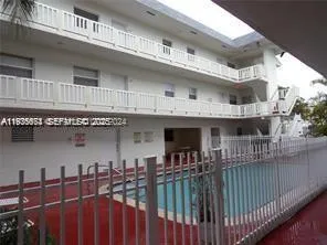 a front view of a building with glass windows