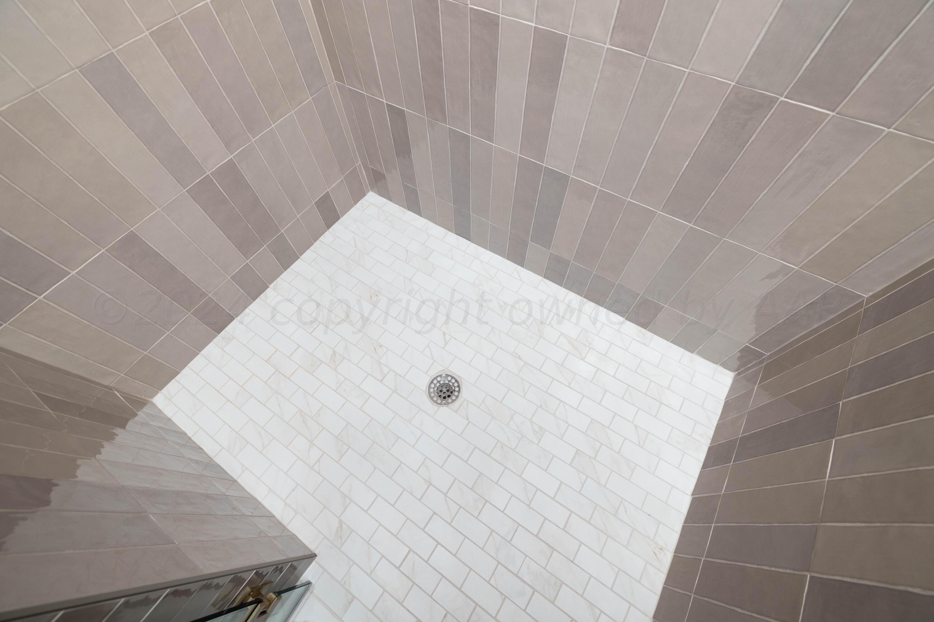 10151 Cactus Flower Road Amarillo, TX 79119 - Photo 19 of 29 a bathroom with a shower