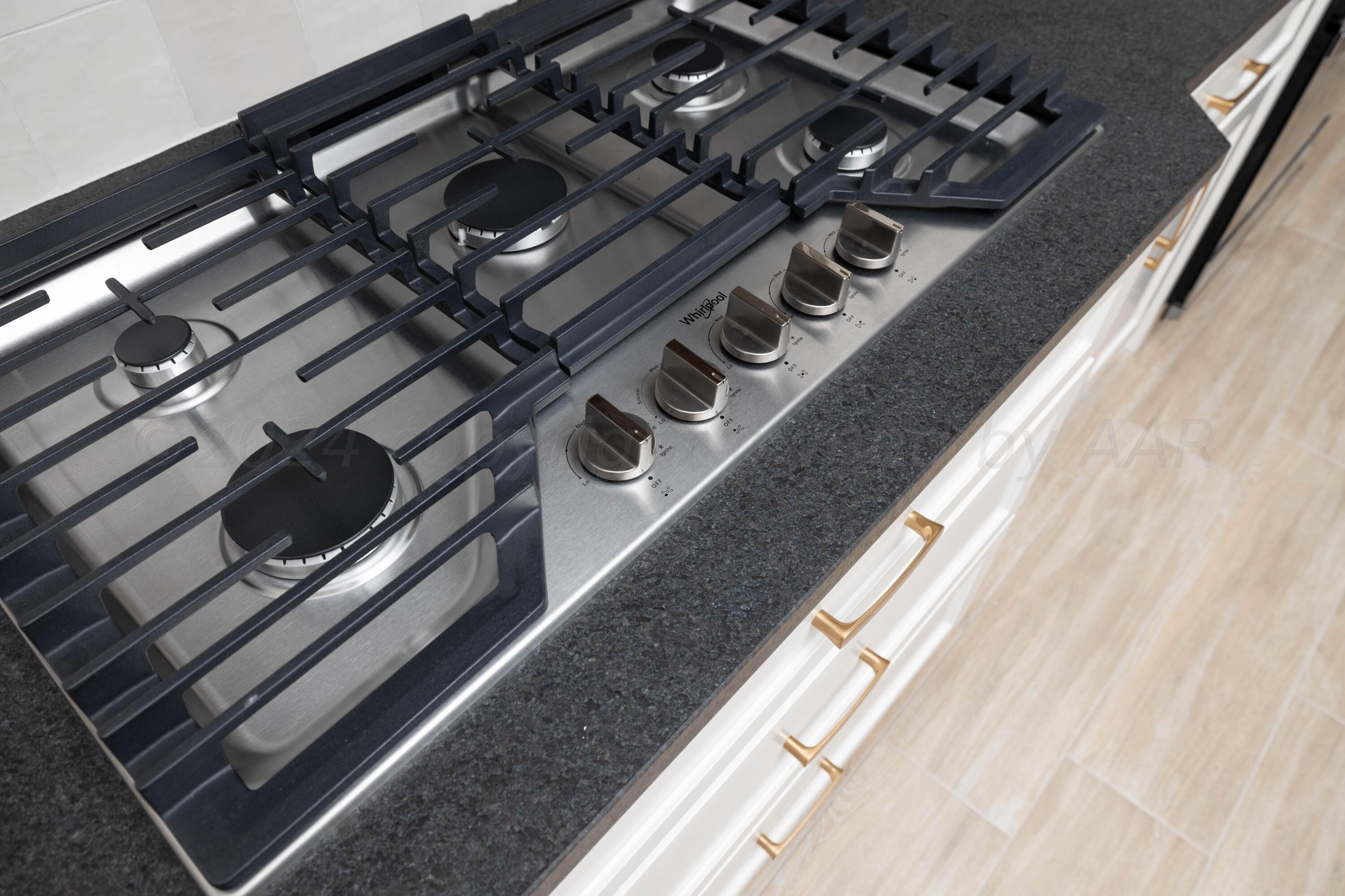 10151 Cactus Flower Road Amarillo, TX 79119 - Photo 7 of 29 a close up of a stove top oven