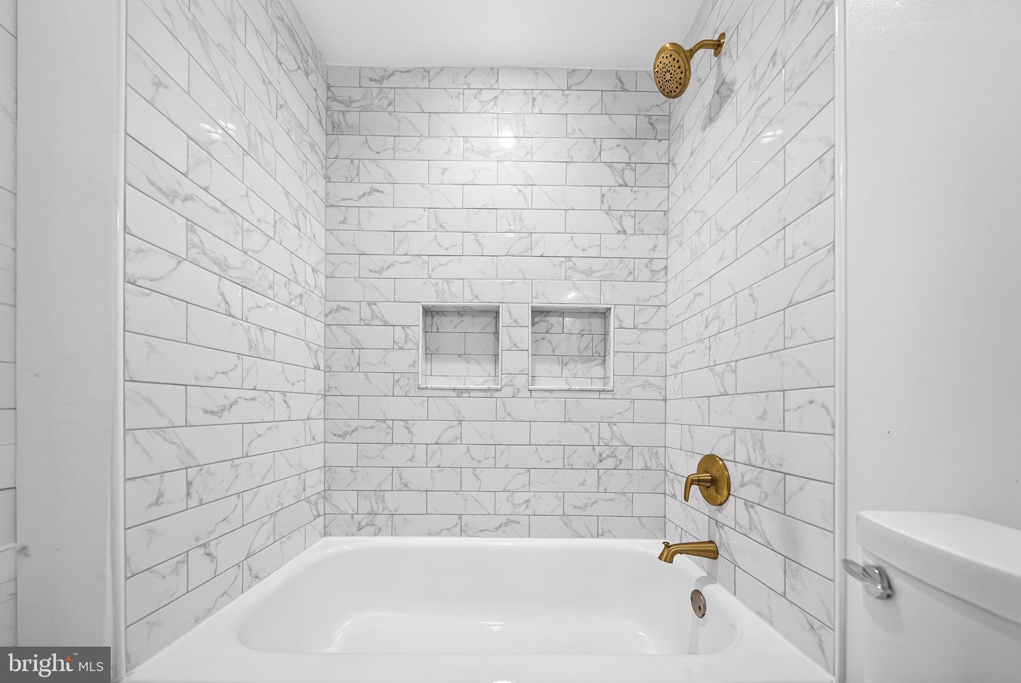 1213 12th Street Northwest, Unit A Washington, DC 20005 - Photo 9 of 34 Renovated Bathroom