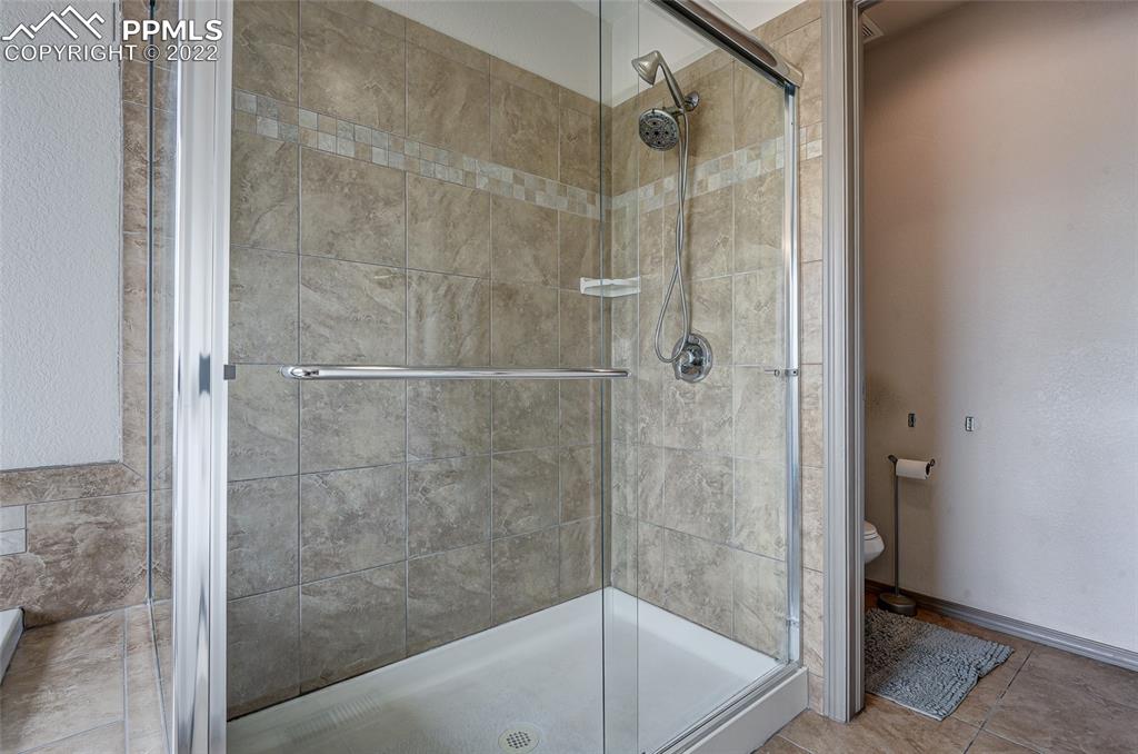 5912 Polly Court Pueblo, CO 81008 - Photo 28 of 40 a bathroom with a shower