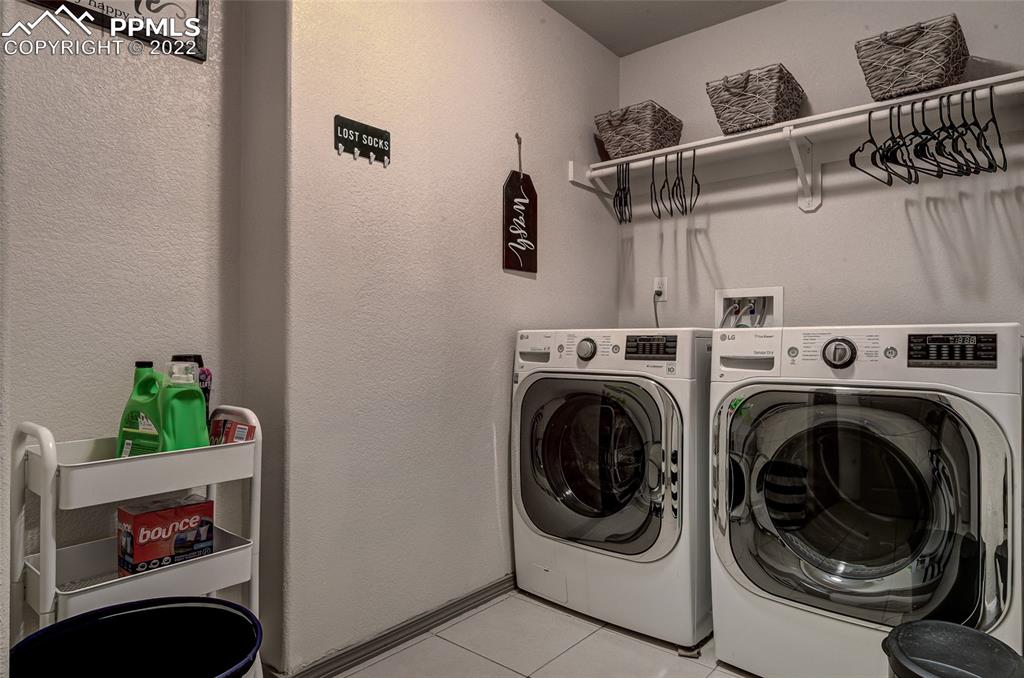 5912 Polly Court Pueblo, CO 81008 - Photo 29 of 40 a utility room with dryer and washer