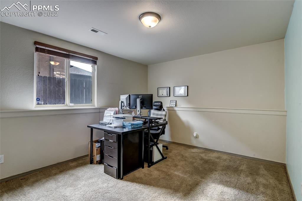 5912 Polly Court Pueblo, CO 81008 - Photo 33 of 40 a view of a workspace with furniture