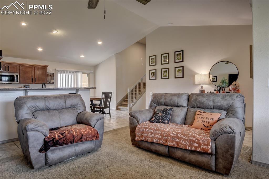 5912 Polly Court Pueblo, CO 81008 - Photo 10 of 40 a living room with furniture and a wooden floor