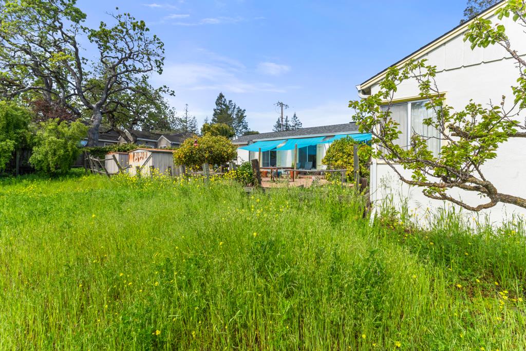 2101 Sharon Road Menlo Park, CA 94025 - Photo 17 of 31 a view of a house with a yard