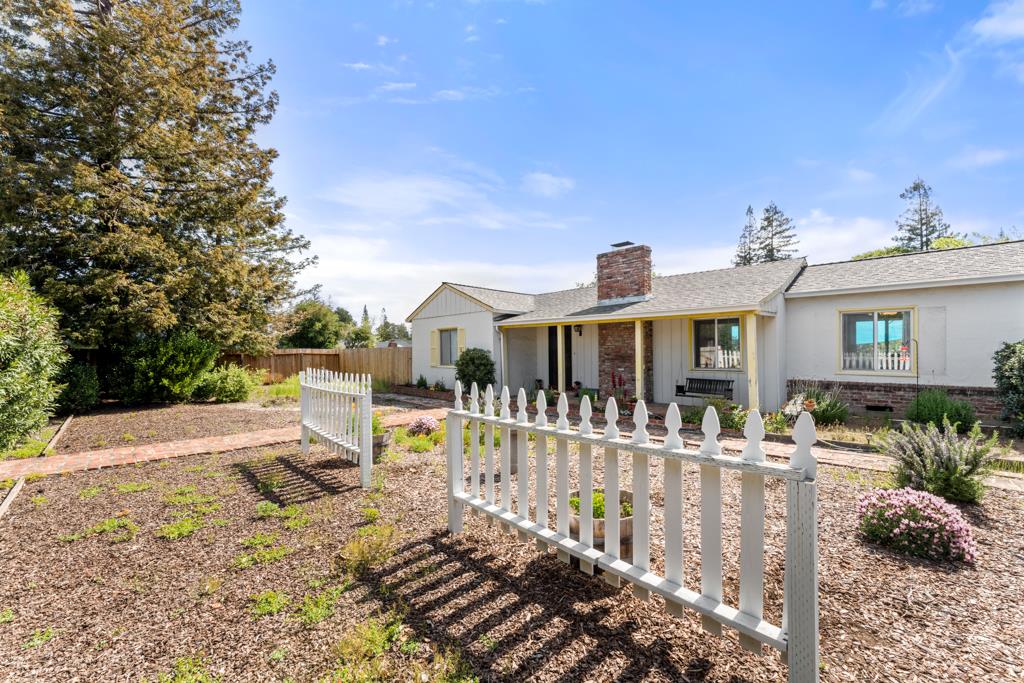 2101 Sharon Road Menlo Park, CA 94025 - Photo 27 of 31 a front view of a house with a yard