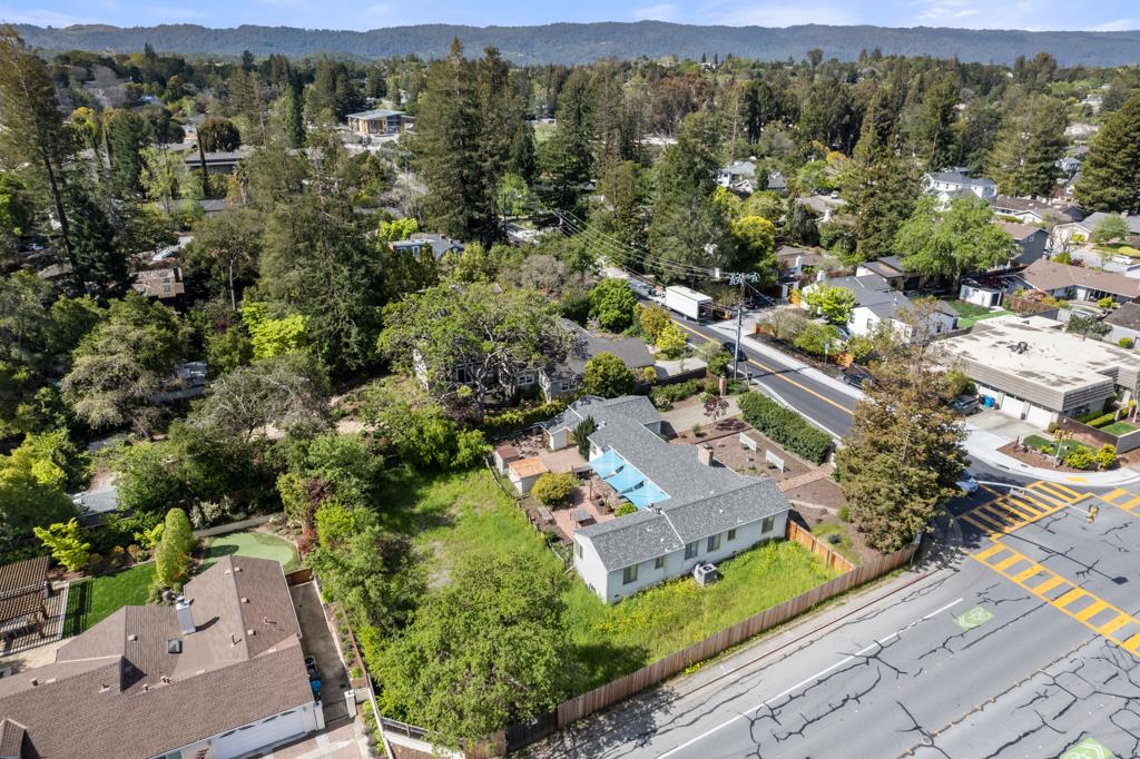 2101 Sharon Road Menlo Park, CA 94025 - Photo 7 of 31 an aerial view of a city with lots of residential buildings and mountain view in back