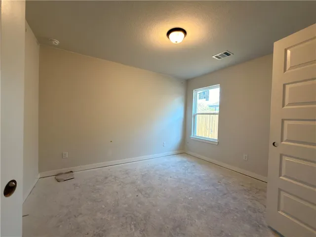a bathroom with a bathtub and a sink
