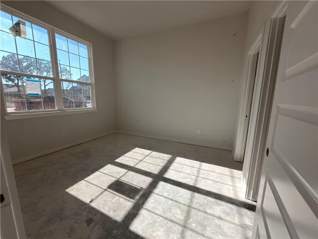 a view of an empty room and window