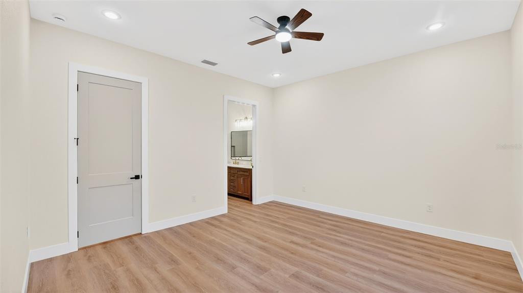 257 Lago Vista Street DeBary, FL 32713 - Photo 21 of 35 a view of empty room with wooden floor