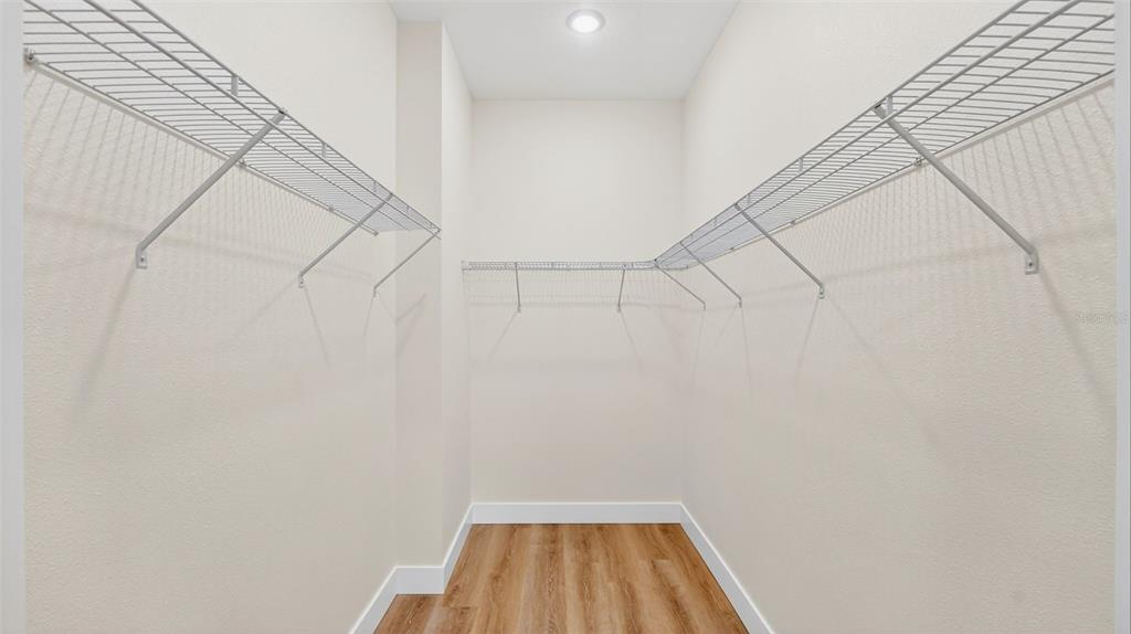 257 Lago Vista Street DeBary, FL 32713 - Photo 24 of 35 a view of a room with racks on the wall