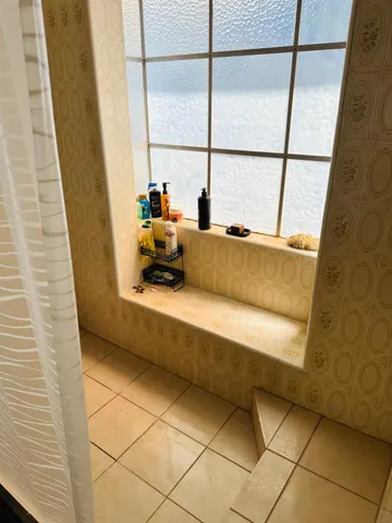 a living room with a rug