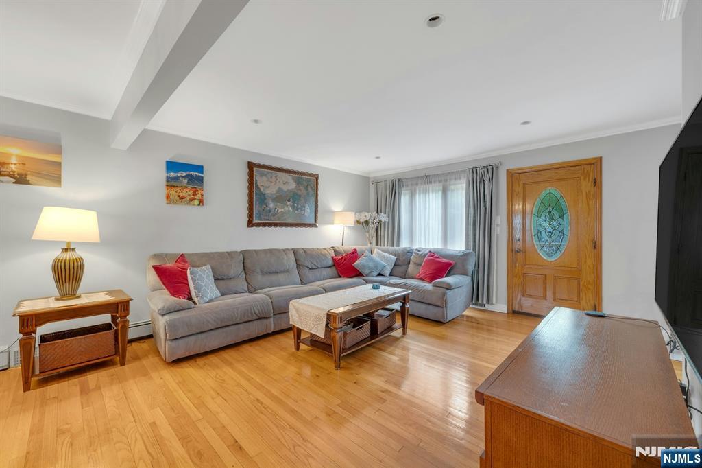 24 Cambridge Road Tenafly, NJ 07670 - Photo 9 of 31 a living room with furniture and a couch