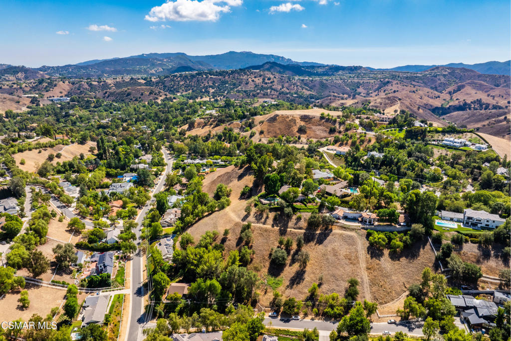 24910 John Fremont Road Hidden Hills, CA 91302 - Photo 3 of 67 an aerial view of residential houses with outdoor space and river
