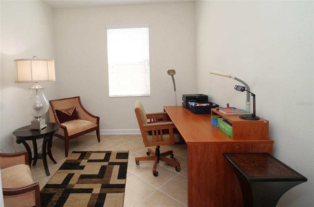 3752 Quaint Lane Clermont, FL 34711 - Photo 13 of 49 a room with furniture and wooden floor
