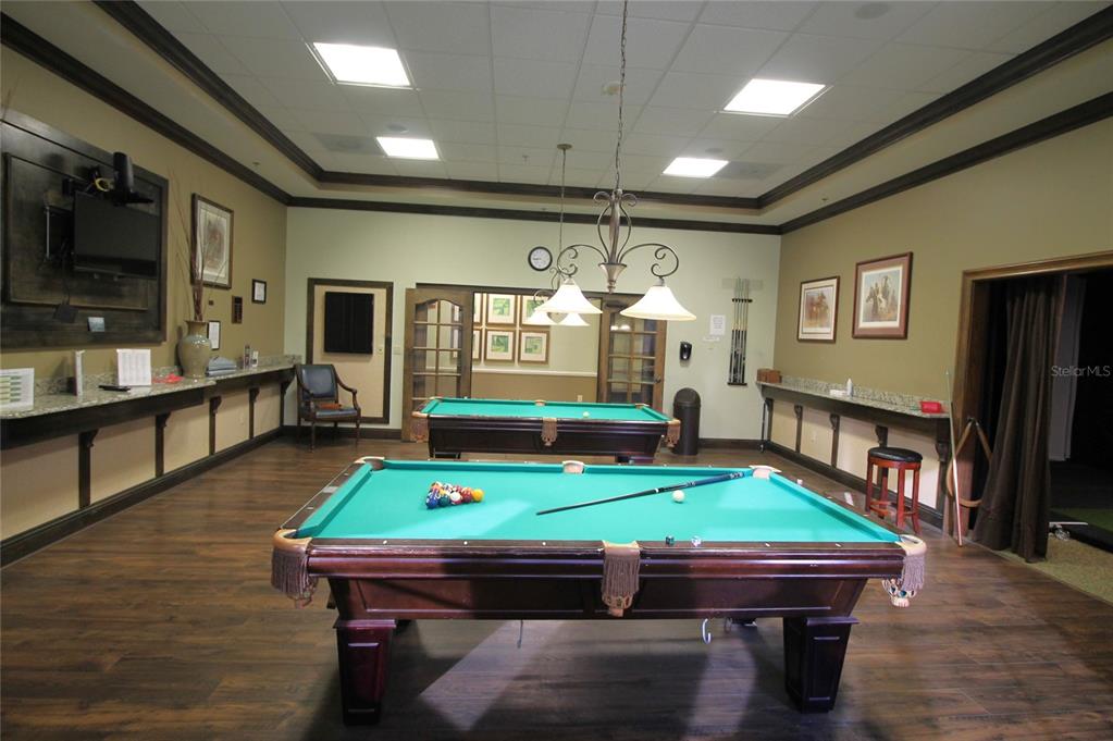 3752 Quaint Lane Clermont, FL 34711 - Photo 32 of 49 a room with furniture pool table flat screen tv and windows