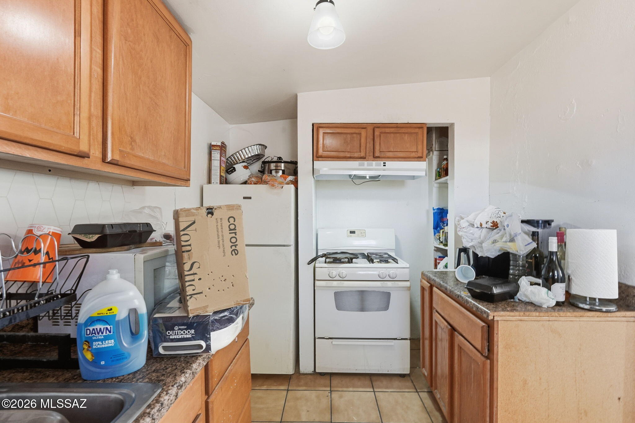 426 East Aragon Road, Unit 1 Tucson, AZ 85756 - Photo 11 of 18 a utility room with sink dryer and washer