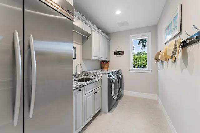 a kitchen with a refrigerator stove and a window