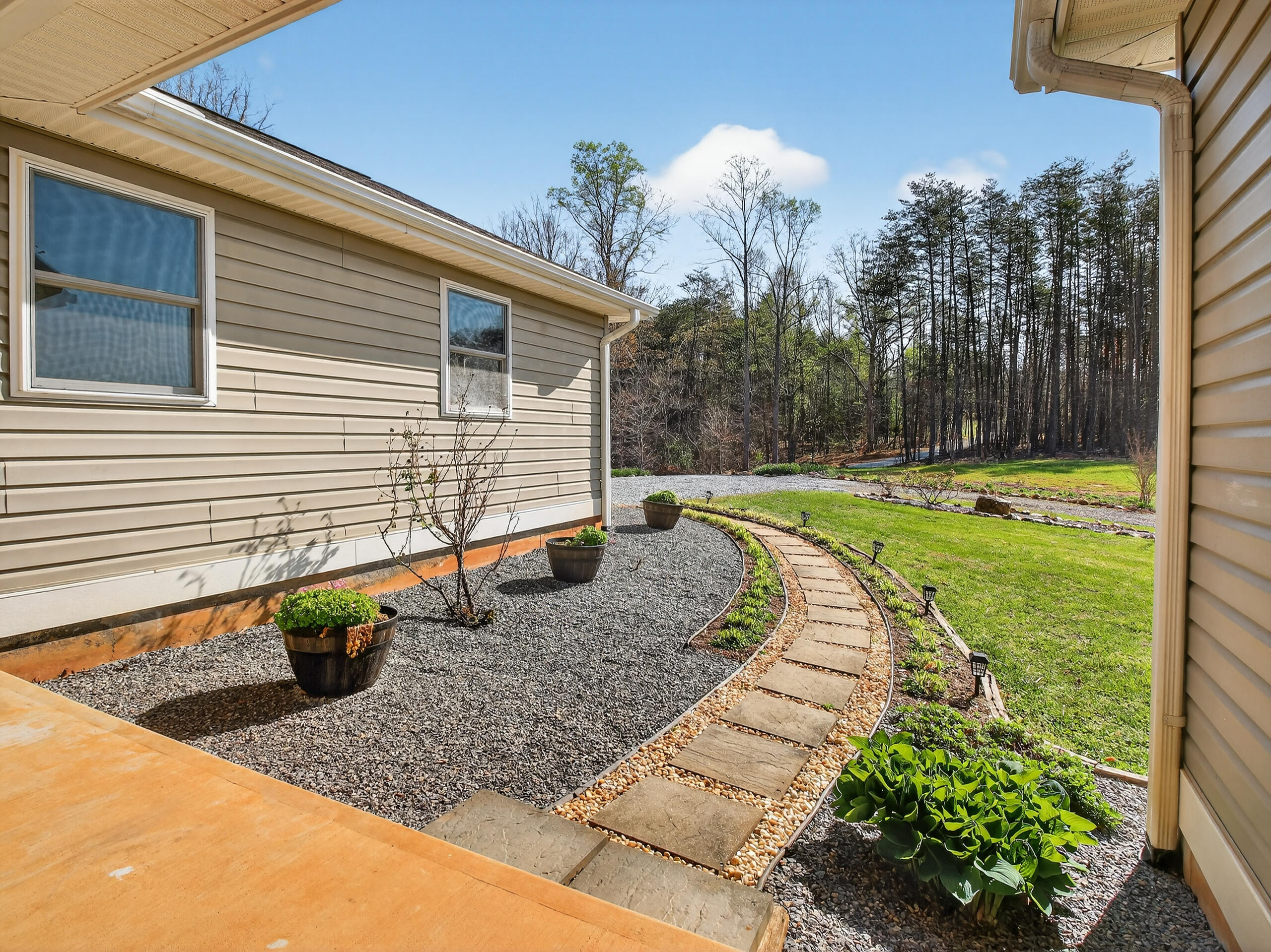 498 Meeks Road Penhook, VA 24137 - Photo 44 of 74 a view of a backyard with swimming pool