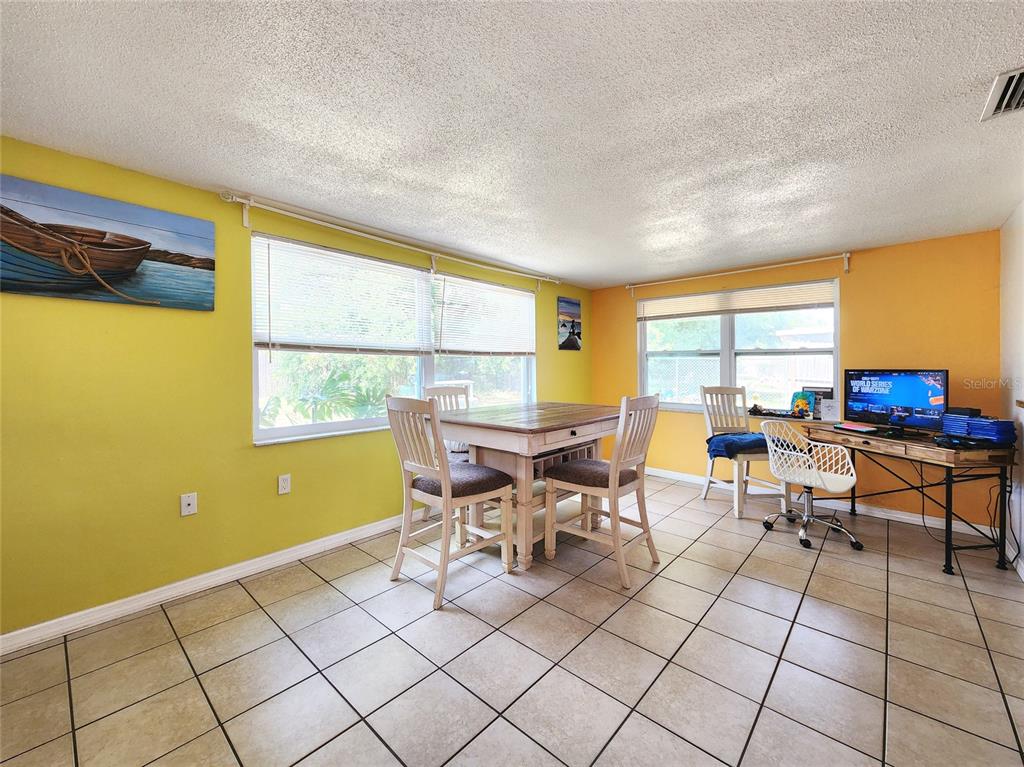7525 Camelot Road Port Richey, FL 34668 - Photo 6 of 31 Could be 3rd bedroom with it's own bath and entrance to screen porch