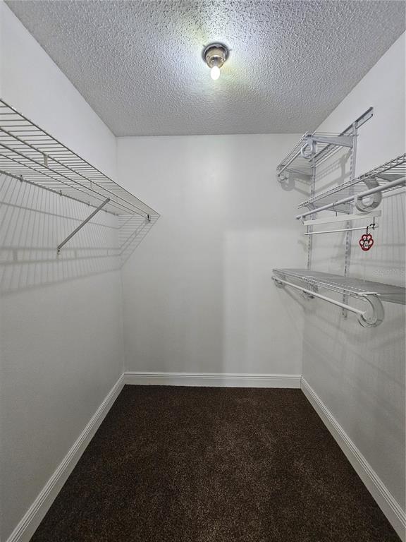 1025 Clovercrest Road Orlando, FL 32811 - Photo 18 of 27 a view of a room with racks on the wall