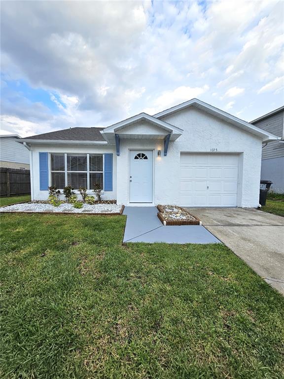 1025 Clovercrest Road Orlando, FL 32811 - Photo 2 of 27 a house view with a garden space