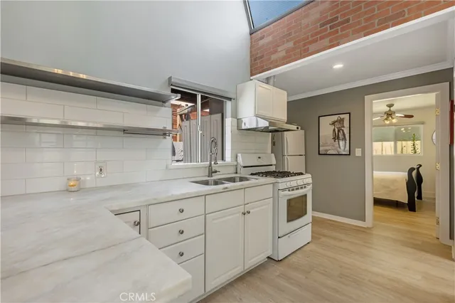 a bedroom with furniture and a toilet