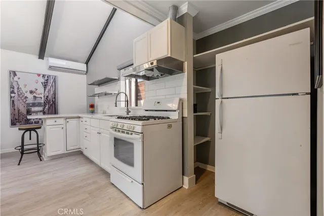 a bathroom with a sink a toilet and a bathtub