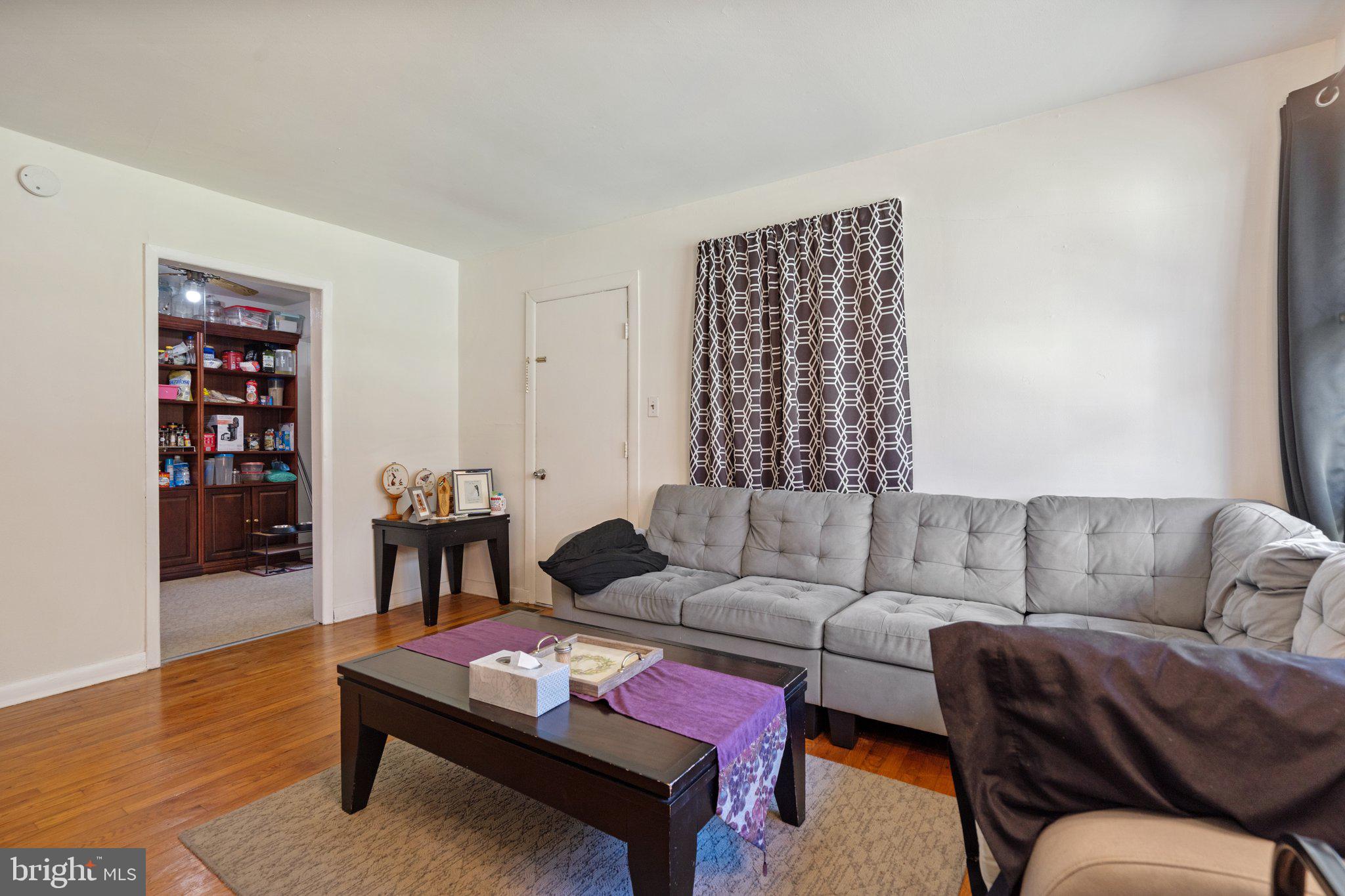 571 Richmond Road Amissville, VA 20106 - Photo 3 of 23 a living room with furniture and a wooden floor