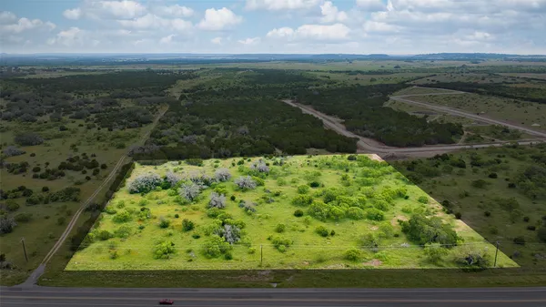 a view of a garden with an outdoor space
