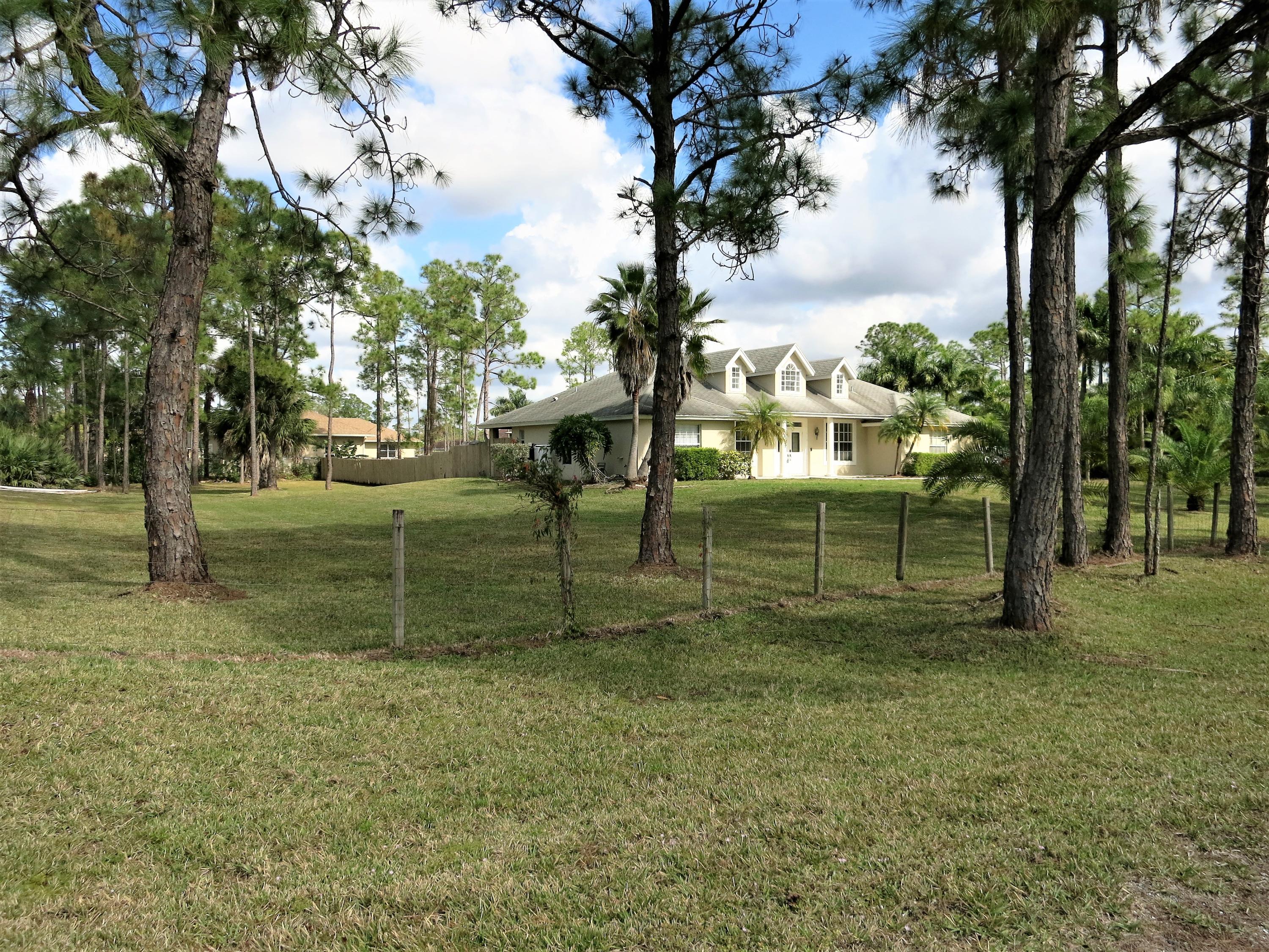 17977 78th Road North Loxahatchee, FL 33470 - Photo 2 of 37 Excellent location sides to paved road