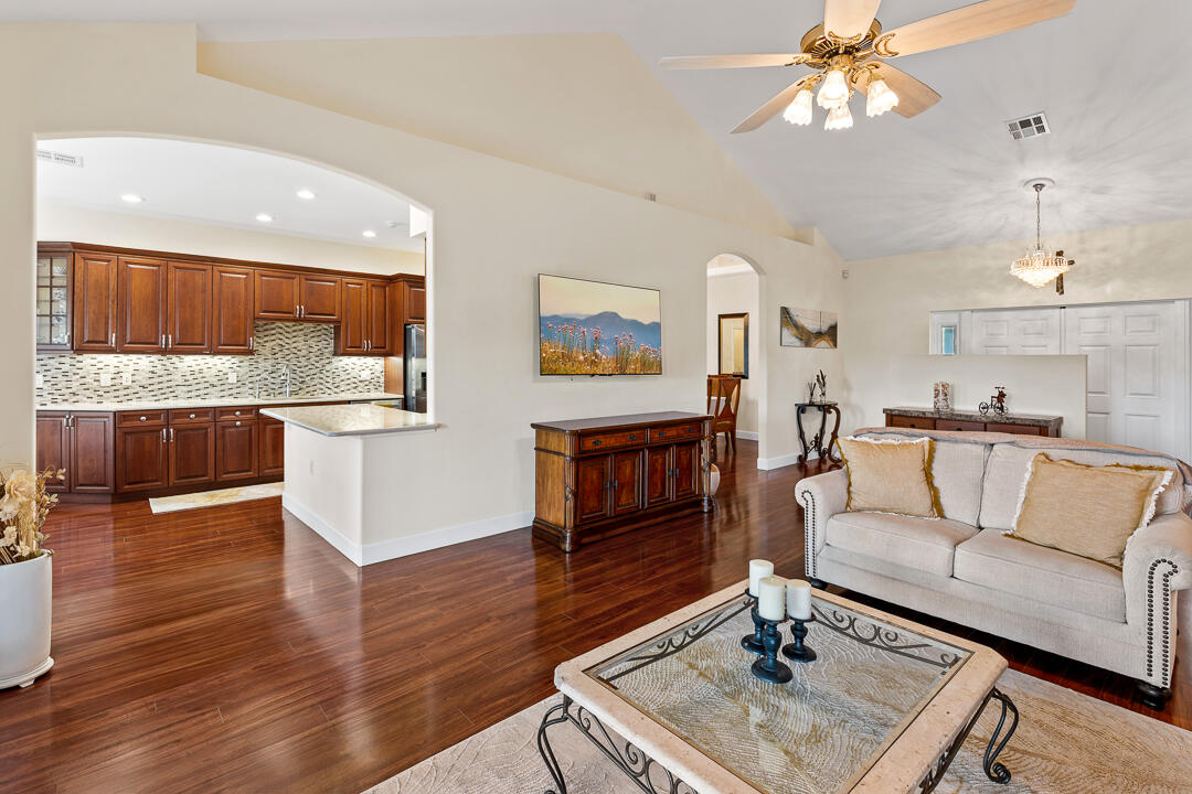 2774 Gentile Road Fort Pierce, FL 34945 - Photo 17 of 70 a living room with furniture and a wooden floor