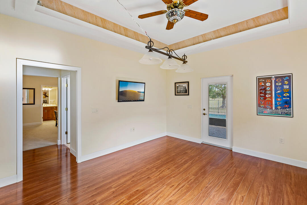 2774 Gentile Road Fort Pierce, FL 34945 - Photo 37 of 70 a view of empty room with wooden floor