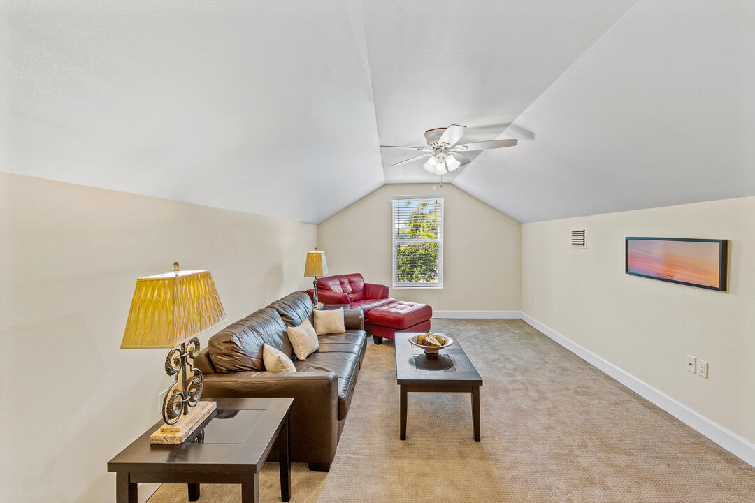 2774 Gentile Road Fort Pierce, FL 34945 - Photo 38 of 70 a living room with furniture and a large window