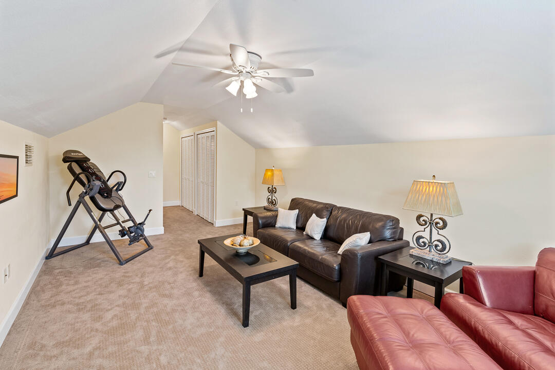 2774 Gentile Road Fort Pierce, FL 34945 - Photo 39 of 70 a living room with furniture and a rug