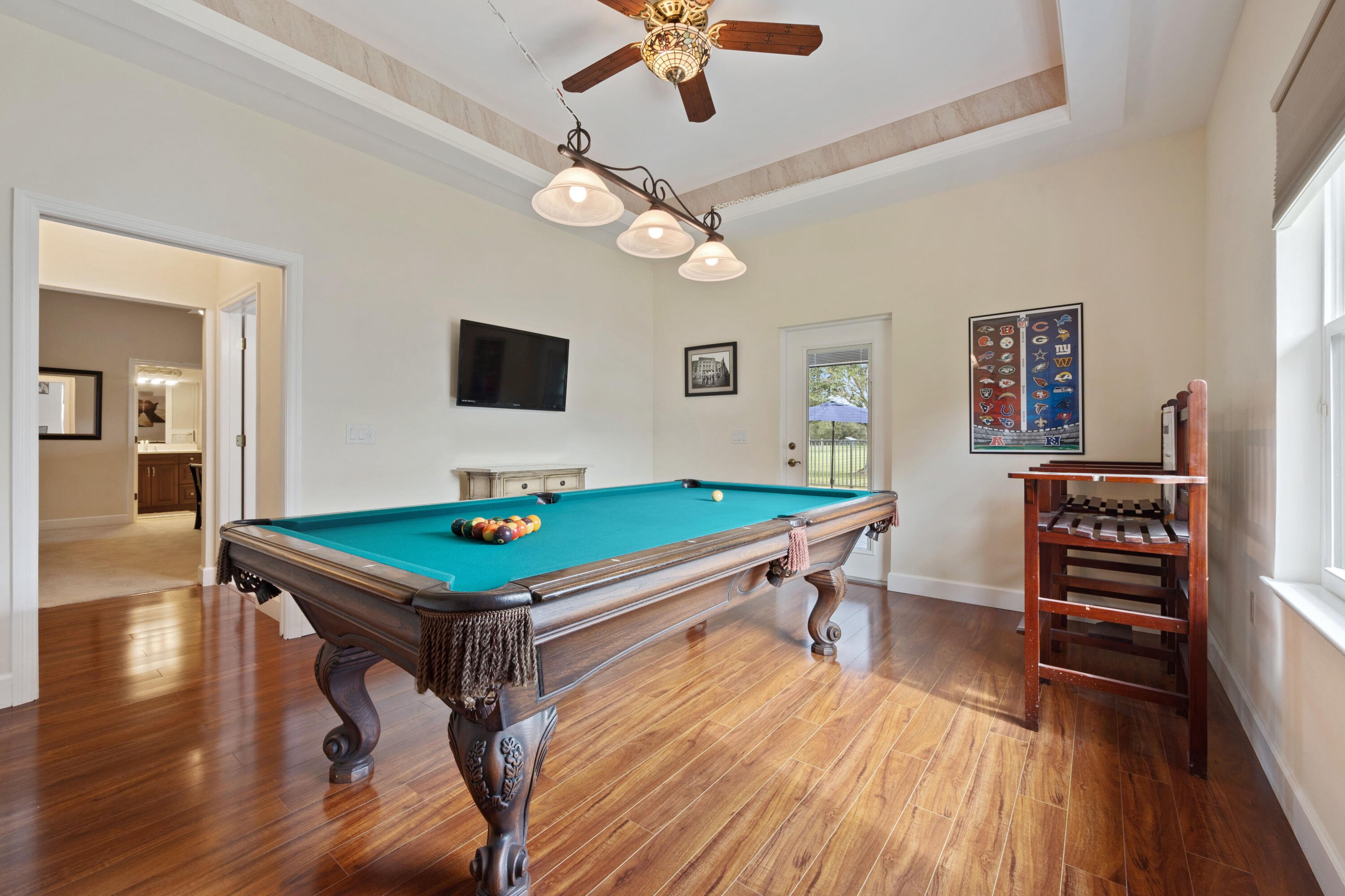 2774 Gentile Road Fort Pierce, FL 34945 - Photo 40 of 70 a room with furniture pool table and wooden floor