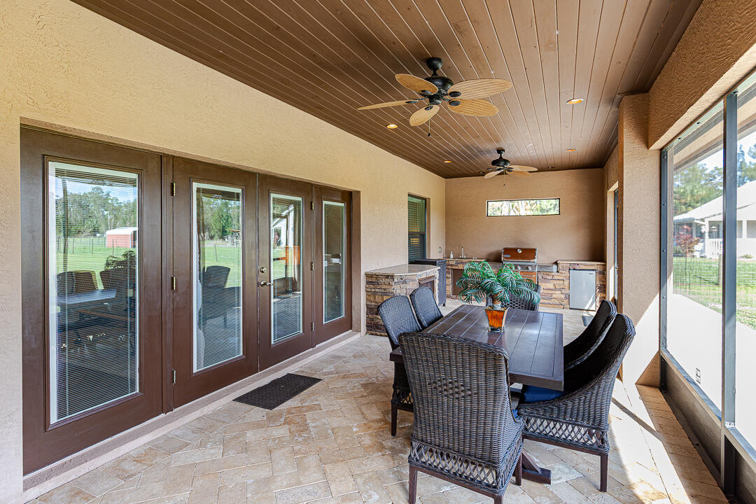 2774 Gentile Road Fort Pierce, FL 34945 - Photo 42 of 70 a view of a dining room with furniture window and outside view