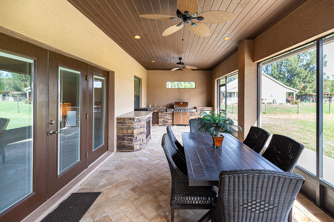 2774 Gentile Road Fort Pierce, FL 34945 - Photo 43 of 70 a view of a dining room with furniture window and outside view