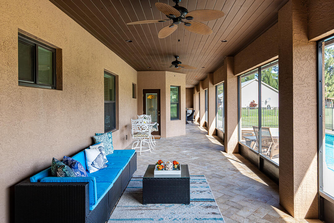 2774 Gentile Road Fort Pierce, FL 34945 - Photo 49 of 70 a living room with furniture and a large window
