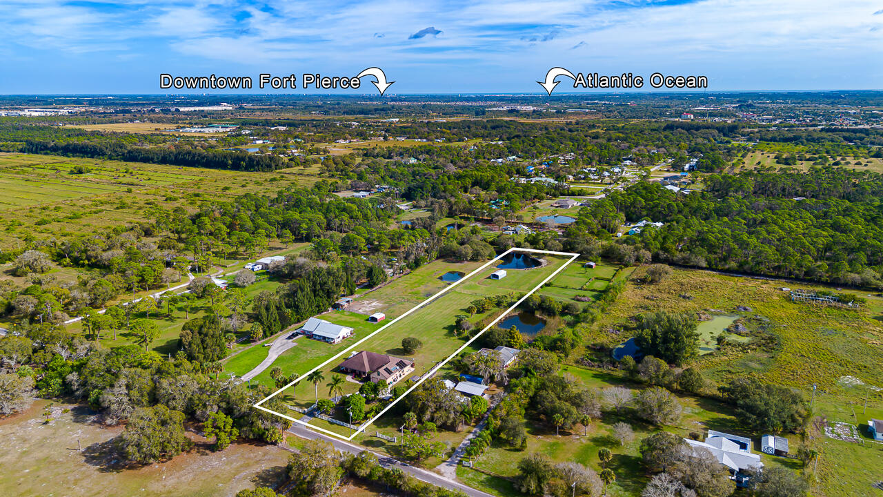 2774 Gentile Road Fort Pierce, FL 34945 - Photo 5 of 70 a view of a yard with an outdoor space