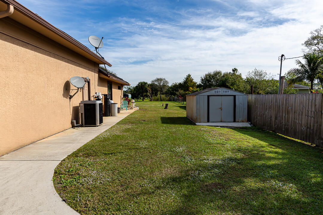 2774 Gentile Road Fort Pierce, FL 34945 - Photo 57 of 70 a view of a backyard