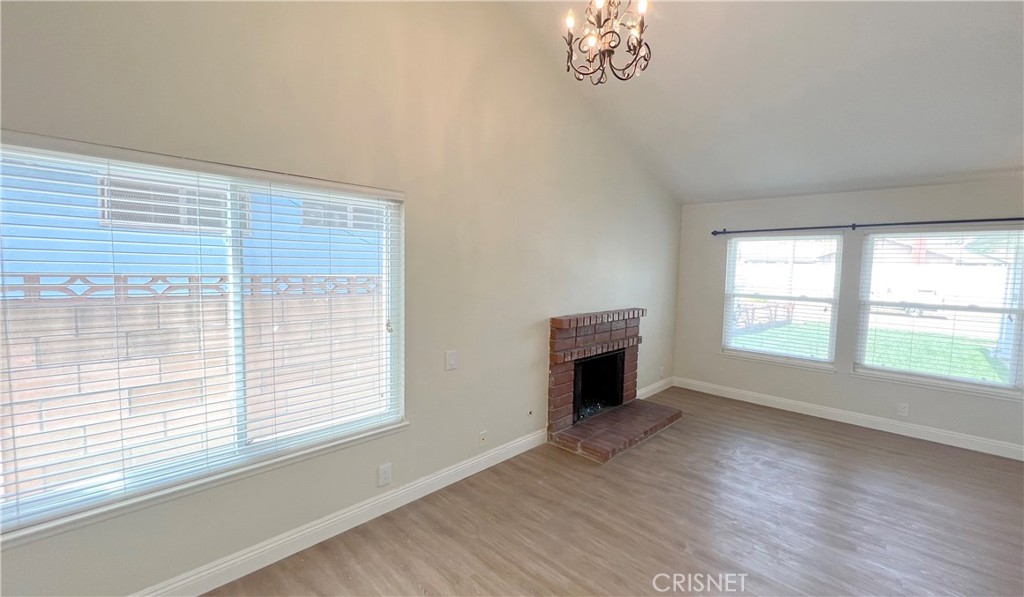 5708 Damon Street Simi Valley, CA 93063 - Photo 6 of 23 a view of empty room with wooden floor and fan