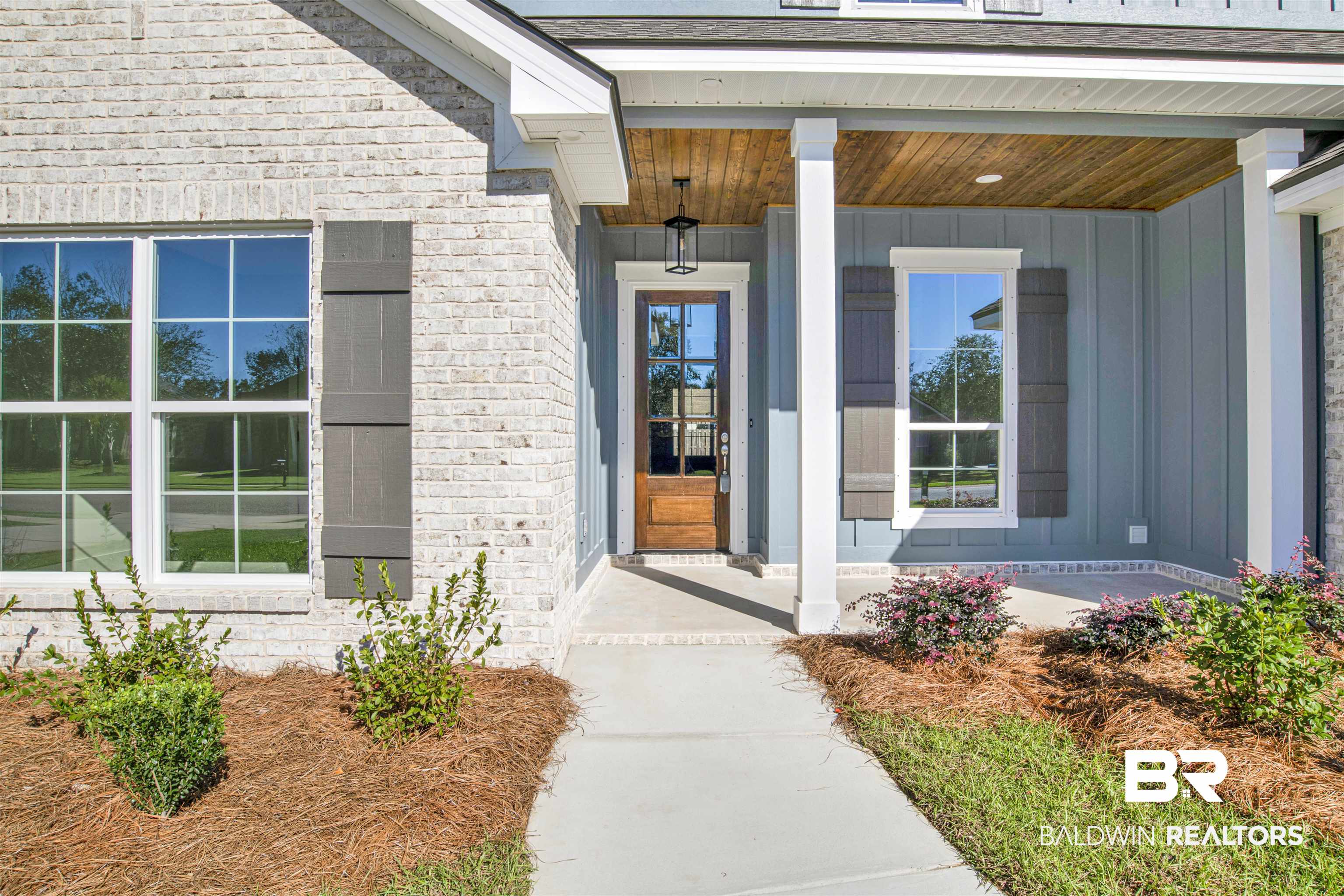 9687 Widgeon Court Daphne, AL 36526 - Photo 3 of 40 View of exterior entry featuring a porch