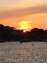 a view of balcony with sunset view