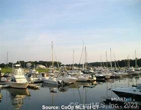 379 Whitfield Street, Unit AN236 Guilford, CT 06437 - Photo 13 of 31 a view of water with boats and trees in ocean