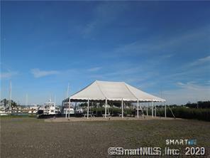379 Whitfield Street, Unit AN236 Guilford, CT 06437 - Photo 20 of 31 a front view of a house with a garden