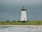 379 Whitfield Street, Unit AN236 Guilford, CT 06437 - Photo 5 of 31 a view of a bench in middle of a field